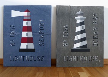 Marina tavlor med olika fyrar målade på canvasväv som ger en känsla av New England.